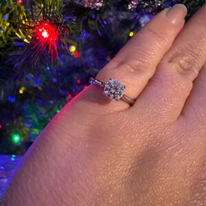 Round moissanite solitaire ring